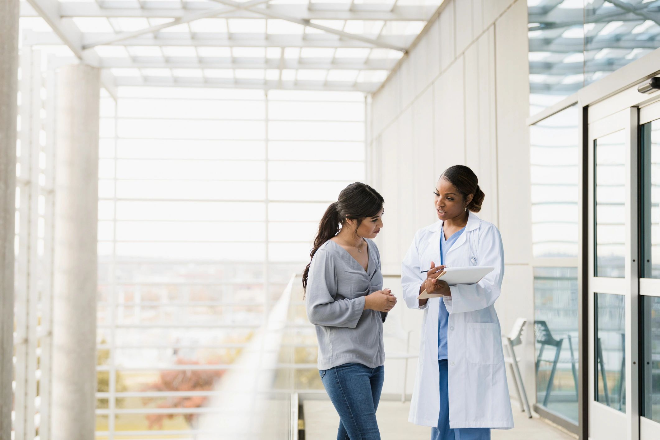 Doctor explains patient's test results to family member